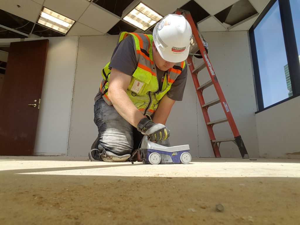 Certified technician using GPR radar during concrete scanning in Vancouver